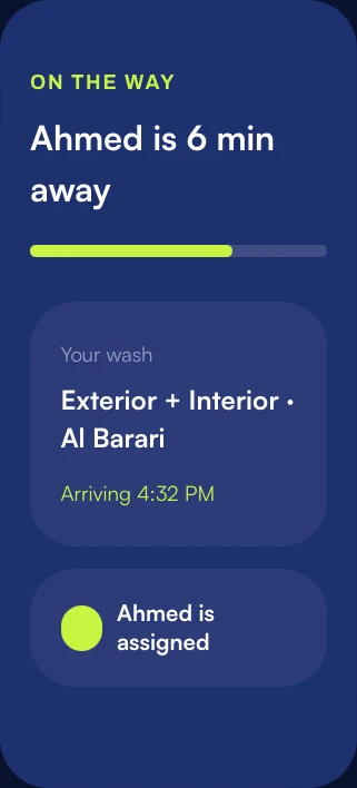 The customer's tracking screen: 'On the way - Ahmed is 6 min away' over a progress bar, the wash booked as Exterior + Interior in Al Barari arriving 4:32 PM, and a line confirming Ahmed is assigned.
